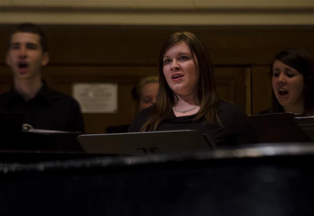 Cassandra Glover sings during the All-Campus Choir perfomance on Sunday at Recital Hall. The choir course is led by choral conducting graduate students Reed Spencer and Jack Templeton.