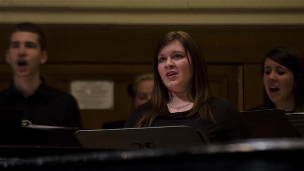 Cassandra Glover sings during the All-Campus Choir perfomance on Sunday at Recital Hall. The choir course is led by choral conducting graduate students Reed Spencer and Jack Templeton.