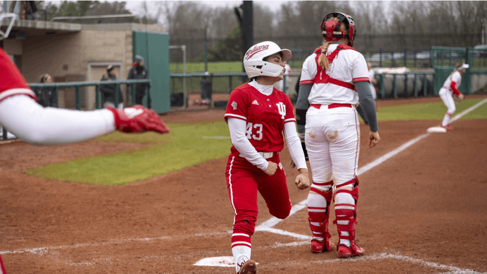 Freshman Elle Smith celebrates after scoring a run April 1, 2023, at Andy Mohr Field in Bloomington. Indiana softball has won 21 consecutive games.﻿