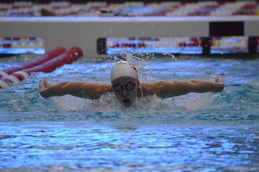Senior Haley Lips swims the 200 yard butterfly during the meet against Cinncinati Thursday afternoon at the Counsilman Billingsley Aquatic Center.