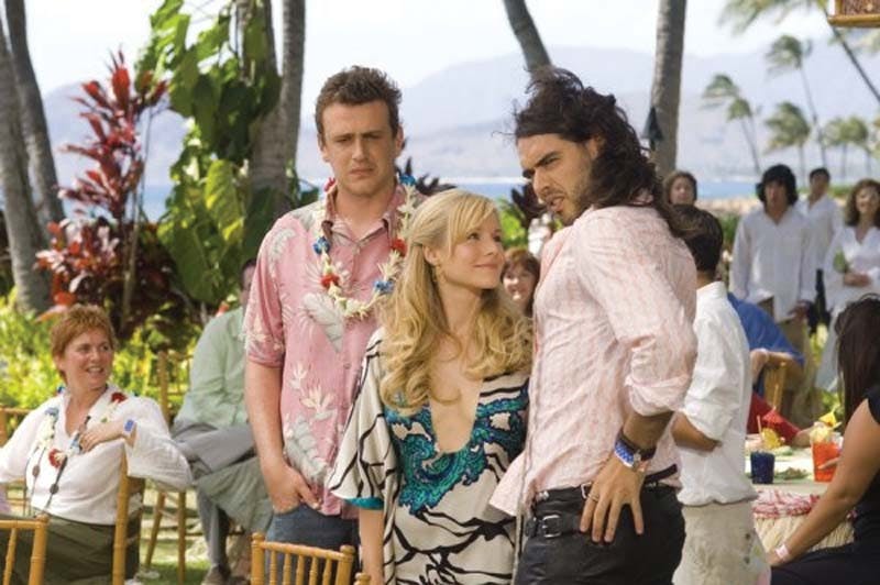 Russell Brand does his best J. Lo impression while fully clothed and British.