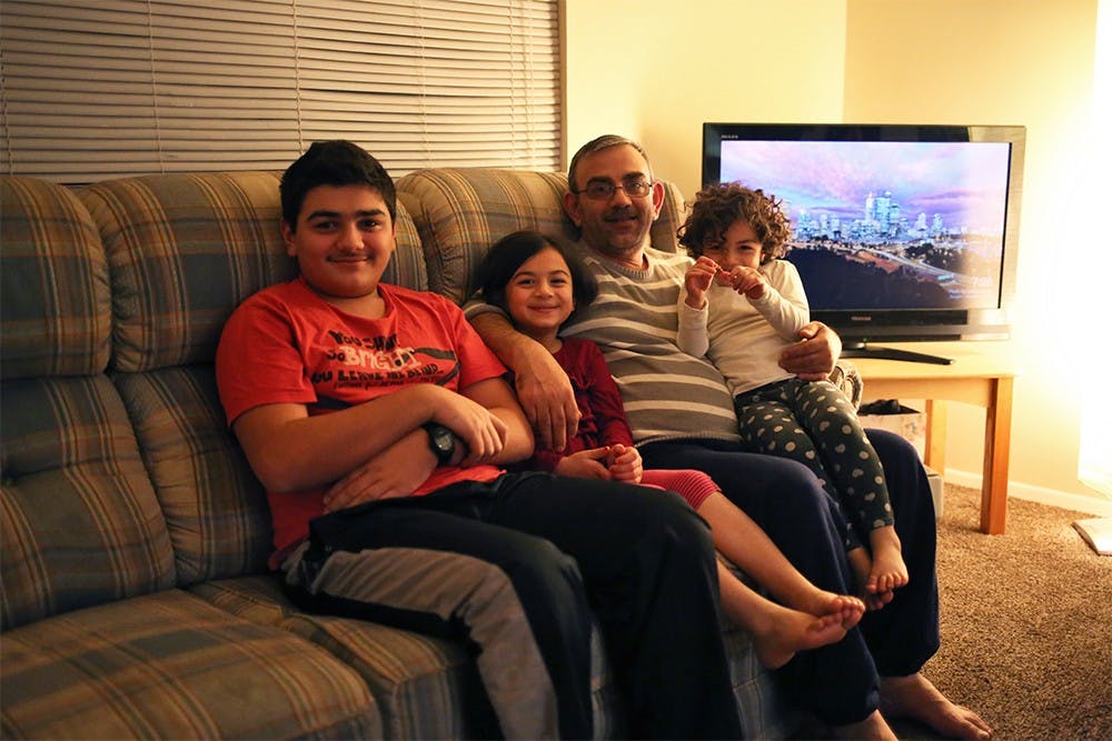 The Batman family settled in Indianapolis about a year ago after fleeing war-torn Syria in 2012. Marwan, the father, works in a restaurant to provide for his wife and four children (wife and oldest daughter not pictured). On Monday, Gov. Mike Pence called for the resettlement of additional Syrian refugees in Indiana to be suspended, following Friday's attack in Paris carried out by ISIS. More than 20 states announced similar plans. 