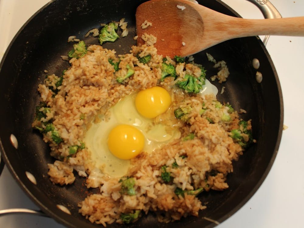 Crack your eggs in the middle of the rice and scramble quickly. 