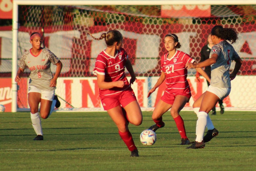 <p>Redshirt freshman midfielder Ava Akeel prepares to pass the ball to sophomore forward Jordyn Levy on Sept. 29, 2022, at Bill Armstrong Stadium. Indiana lost to Rutgers 0-1.</p>