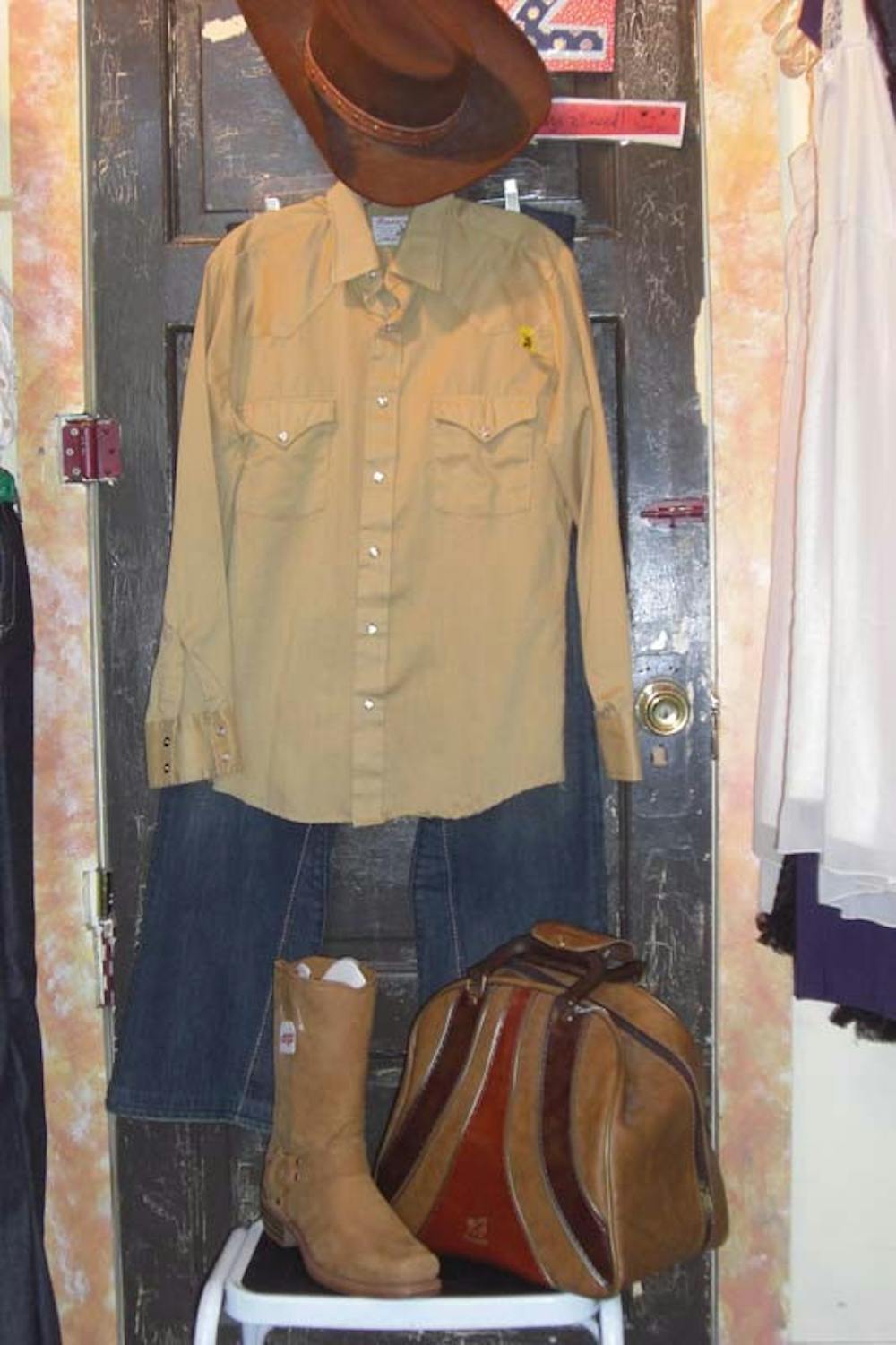 Cactus Flower, 322 E. KIrkwood Ave.
• Western-style beige button-up T-shirt $16
• Cowboy hat $30
• Detailed medium-wash jeans $12
• Leather bag $20
TOTAL: $78