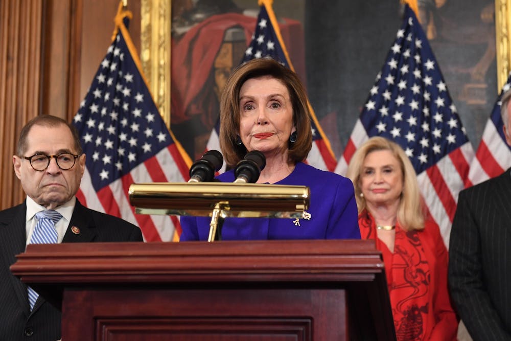 House Speaker Nancy Pelosi, D-CA, speaks next to House Judiciary Chairman Jerry Nadler, left, D-NY, as they announce articles of impeachment for President Donald Trump during a press conference Tuesday at the U.S. Capitol in Washington, D.C.