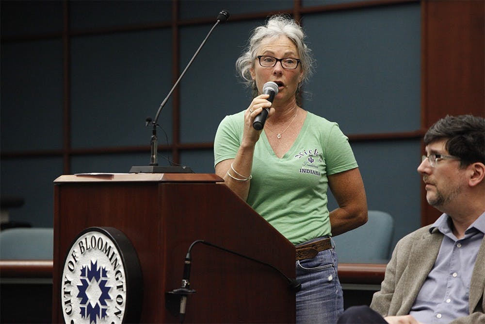 Susan Bright, co-owner of Nick's English Hut, speaks during the city hall meeting Wednesday in response to her "Bum Commerce on Kirkwood" note written in early June.  Bloomington residents gathered to express their opinions on how to deal with what Bright defines as "bums" on Kirkwood Ave.  This references homelessness, crime, and panhandling on the avenue.