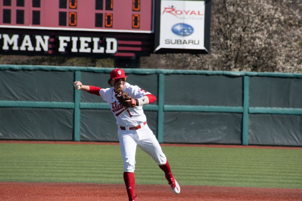 <p>Senior shortstop Philip Glasser throws the ball to first base March 26, 2023, at Bart Kaufman Field in Bloomington. Indiana baseball faces Penn State this weekend.﻿</p>