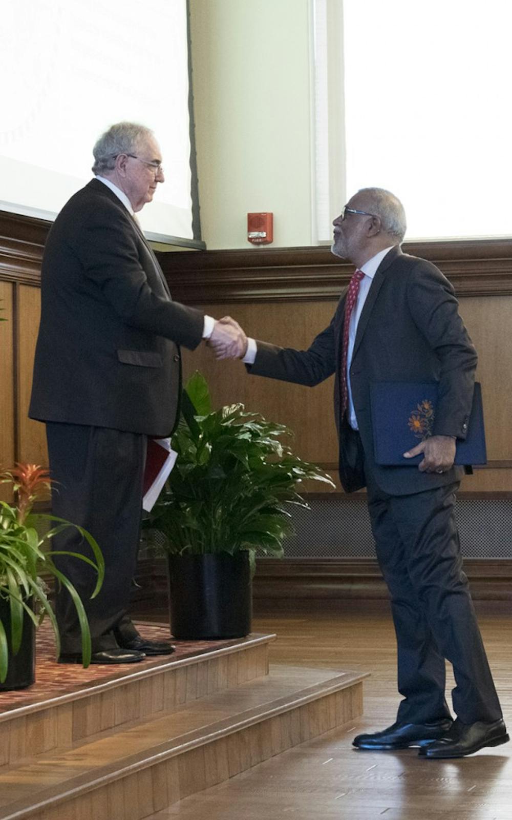 Patrick O’Meara welcomes Dr. Narendra Jadhav to the stage in Presidents Hall in Franklin Hall. Jadhav is a member of the Indian Parliament and obtained his Ph.D. in economics at Indiana University. 