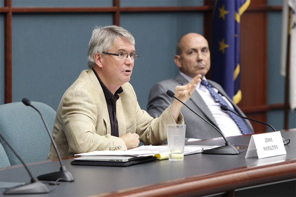Mayoral candidate John Hamilton answers a question posed to him by a panel of Bloomington and IU officials, who got the questions from members of the audience, during the League of Women Voter's mayoral candidate forum Monday at City Hall.