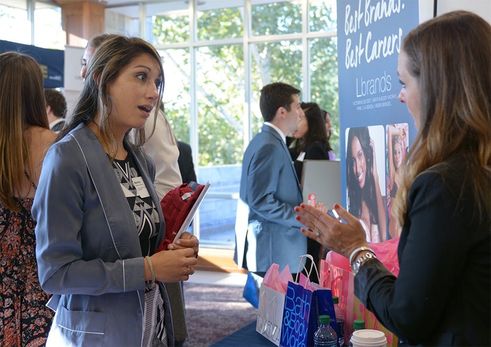 IU sophomore Mariela Jimenez talks to a recruiter from the L Brands during a career fair hosted at IMU on Thursday afternoon. Jimenez is looking for a design internship to gain more real professional experience. 
