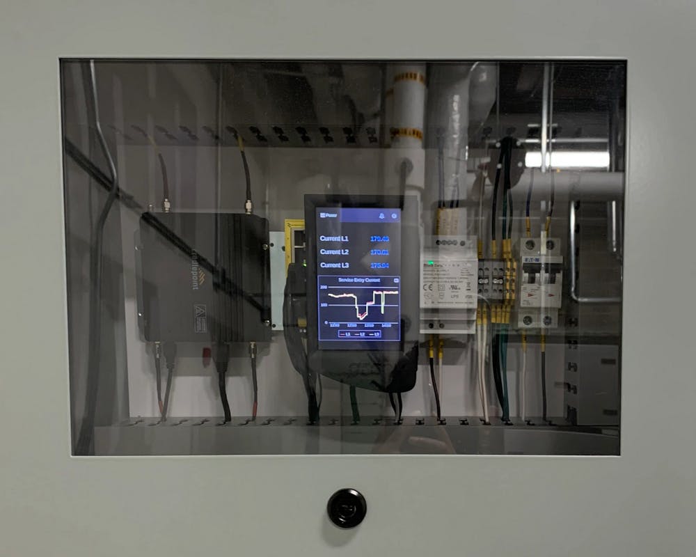 <p>An energy monitoring kit installed and connected to a machine at the Emerging Manufacturing Collaboration Center, is seen in Indianapolis&#x27; 16 Tech Innovation District. Researchers at IU are using artificial intelligence and machine learning to help manufacturers statewide reduce their carbon footprint.</p><p><br/><br/></p>