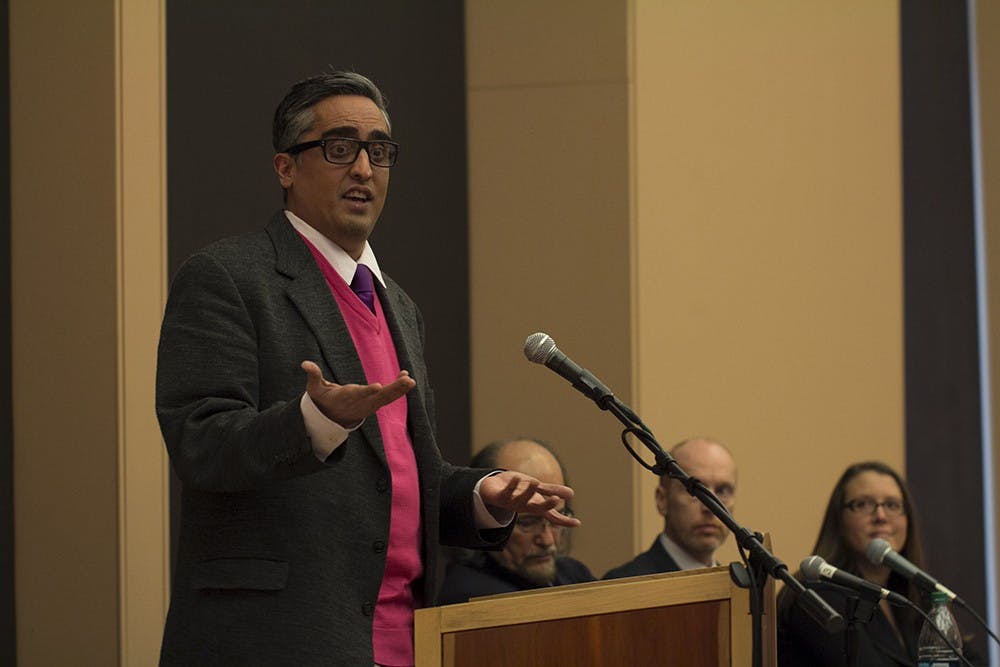 Arsalan Iftikhar speaks at the Covering Islam event at the Neal-Marshall Black Culture Center on Monday.