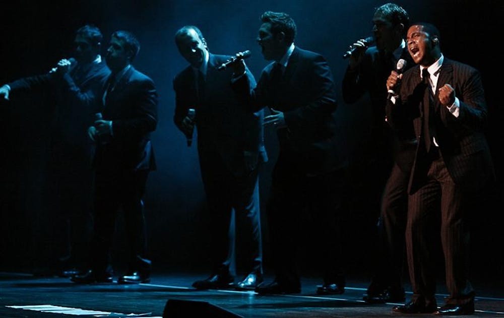 IU alumni Jerome Collins, of Straight No Chaser, sings Saturday evening at the IU Auditorium. Straight No Chaser was signed by Atlantic Records, after a video on YouTube hit eight million views.