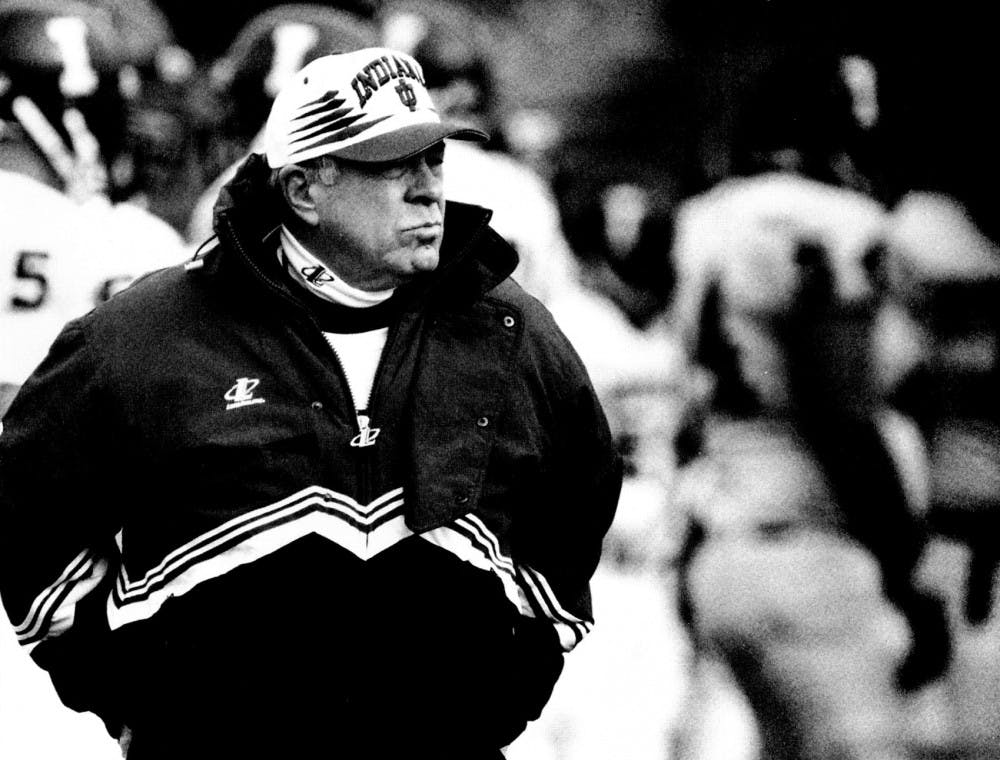 <p>Former IU Coach Bill Mallory watches IU play the Purdue Boilermakers in West Lafayette, Ind., for the Old Oaken Bucket in 1996. Mallory died Friday at the age of 82.</p>