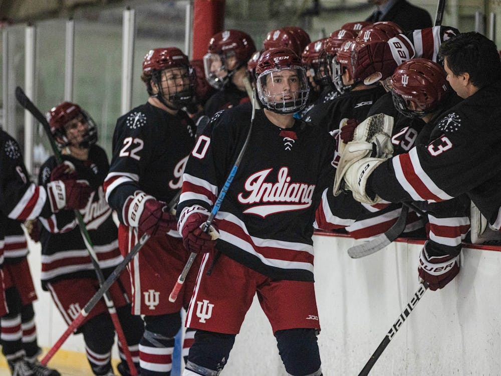 The IU club hockey team high-fives between periods during a match against Bowling Green State University Oct. 14, 2022, at the Frank Southern Ice Arena. Indiana beat NC State and Virginia Tech before falling to North Carolina at the ACC Inviational on Oct. 21-23 in Vinton, Virginia. 