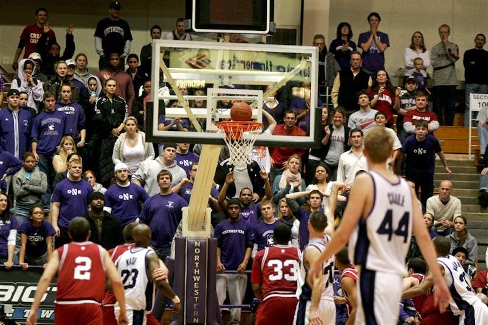 Northwestern's Guard Craig Moore sinks a free throw with six seconds left in the Wildcats' game against IU Wednesday evening in Evanston, Ill. The free throw was the game winning shot for Northwestern, with the score 77-75.