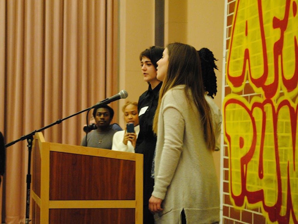 Ollie McDermott, Isa Baile-Voyles and Tamara Brown sing the "Negri National Anthem" by James Weldon Johnson. This was apart of the 15th annual African American Read-in that was held in the Neal-Marshall Center.