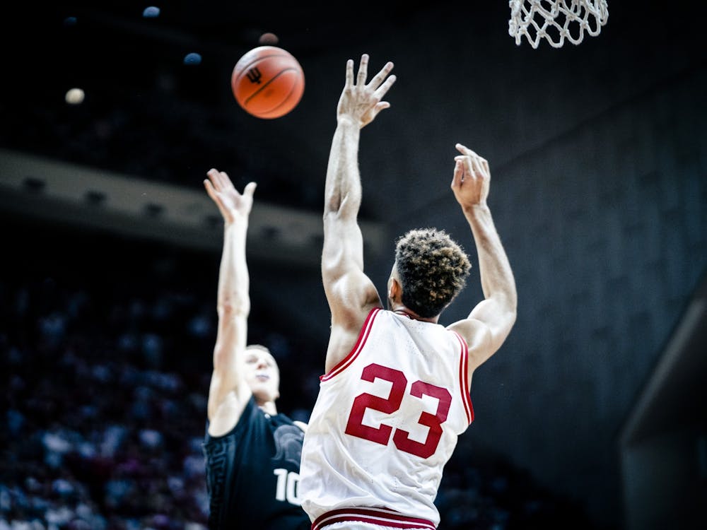 Senior forward Trayce Jackson-Davis attempts to block a shot Jan. 22, 2023, at Simon Skjodt Assembly Hall in Bloomington. Indiana lost to Michigan State 80-65 in East Lansing on Tuesay night.