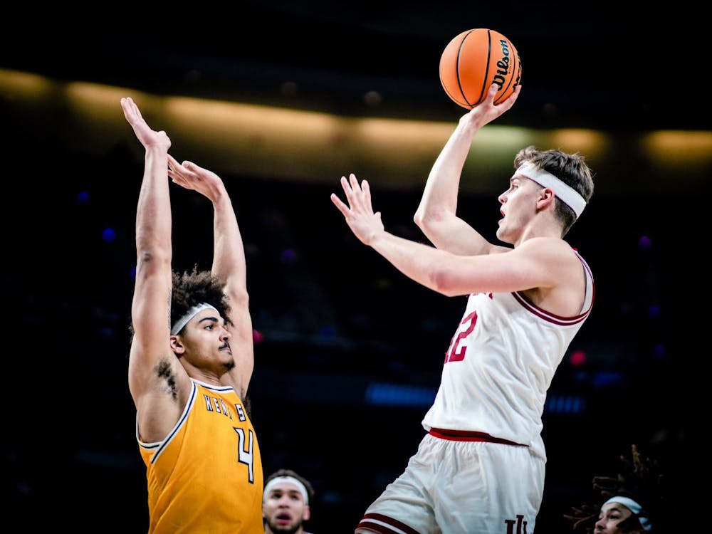 Graduate senior forward Miller Kopp drives to the basket March 17, 2023, at MVP Arena in Albany, New York. Indiana defeated Kent State 71-60.