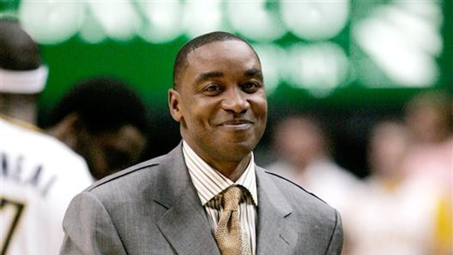 In this April 16, 2008 file photo former New York Knicks coach Isiah Thomas smiles before a basketball game in Indianapolis. Thomas has accepted the job as Florida International's basketball coach. The school said Tuesday, April 14, 2009 that Thomas signed a five-year contract.