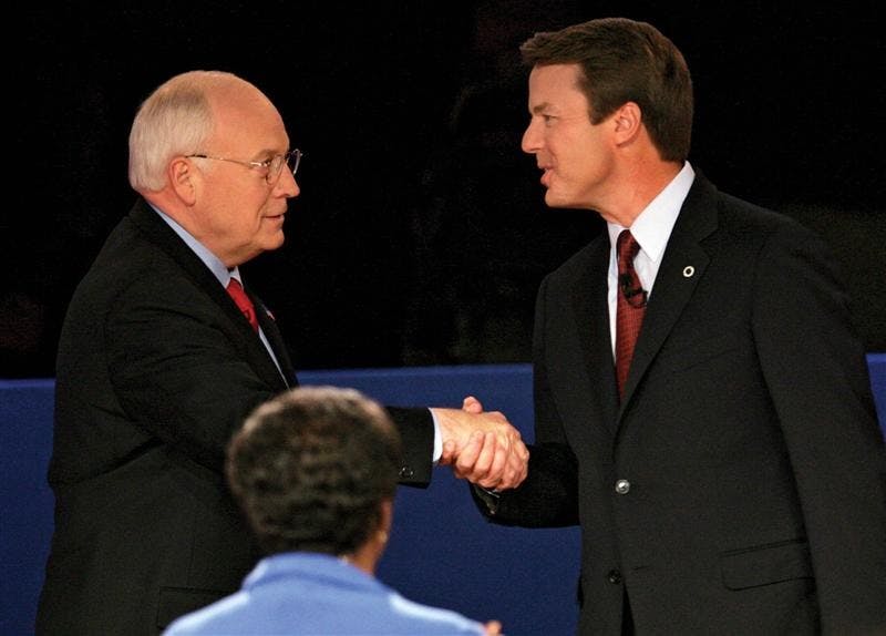 Vice President Dick Cheney and Democratic vice presidential candidate John Edwards shake hands before their vice presidential debate at Case Western Reserve University on Oct. 5, 2004 in Cleveland on Tuesday. In the foreground is moderator Gwen Ifill.