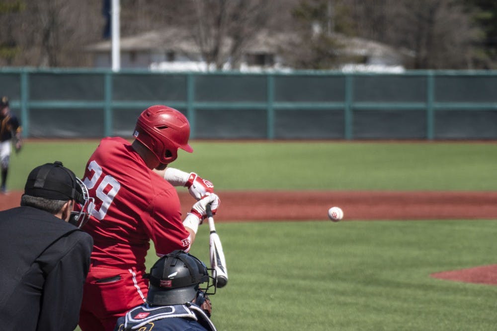 Senior catcher Ryan Fineman swings at a pitch March 17 at Bart Kaufman Field. Indiana defeated Canisius College to improve to 11-8 on the season.