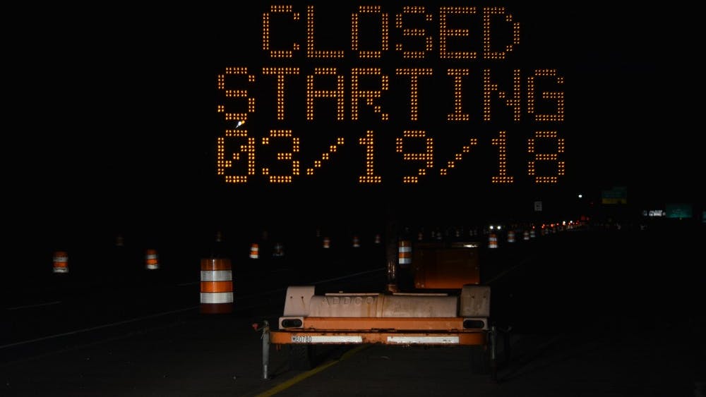 A traffic sign notifies southbound motorists on State Road 37 of the impending closure of the North Walnut Street and State Road 37 partial interchange. Access will be temporarily closed to drivers starting March 19.