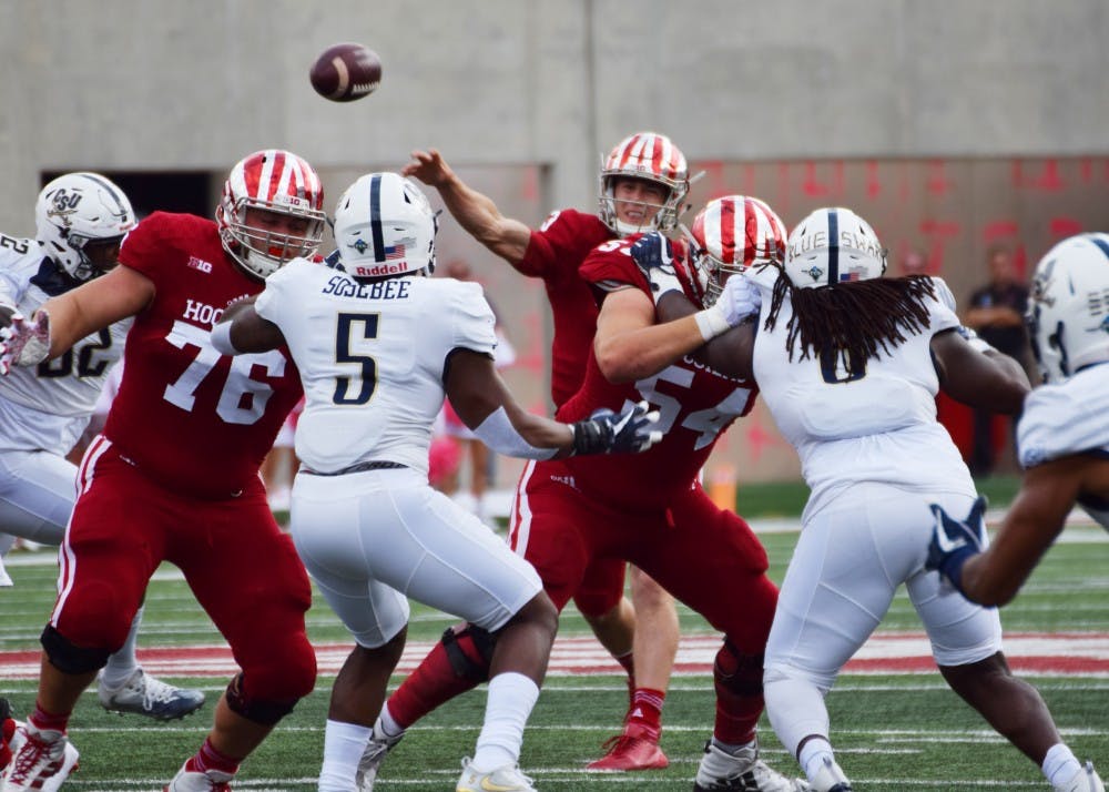 <p>Sophomore quarterback Peyton Ramsey throws the ball towards the goal line during the first quarter of the game against Charleston Southern on Oct. 7. IU will look to win its first Big Ten game this Saturday at Maryland.</p>