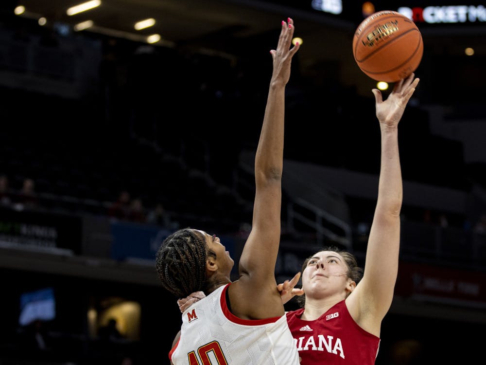 Junior forward Mackenzie Holmes attempts a shot during Indiana&#x27;s Big Ten Tournament game against Maryland on March 4, 2022, at Gainbridge Fieldhouse in Indianapolis. Indiana will play at 2 p.m. Saturday in Bridgeport, Connecticut.