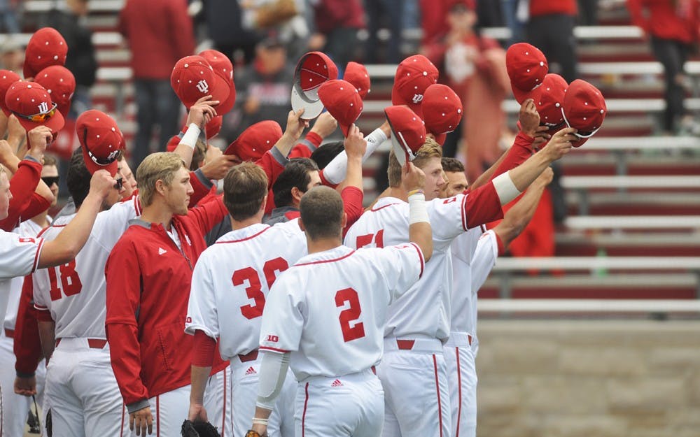 Members of the&nbsp;IU baseball team salute their fans after finishing the last game of the regular season against Illinois on May 15, 2016.