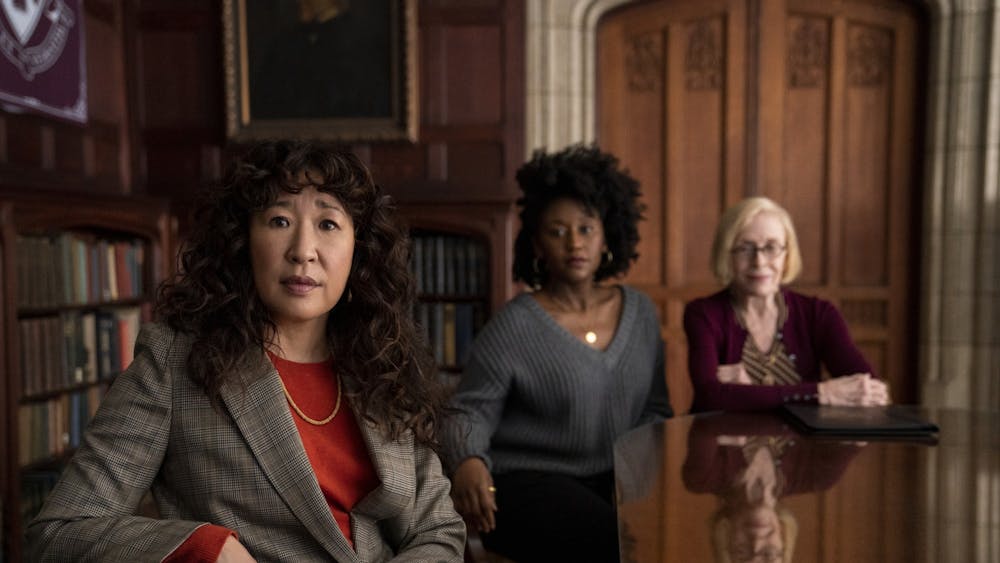 Sandra Oh, Nana Mensah and Holland Taylor pose seated for their show, &quot;The Chair.&quot; The show  premiered to Netflix audiences Aug. 20, 2021.
