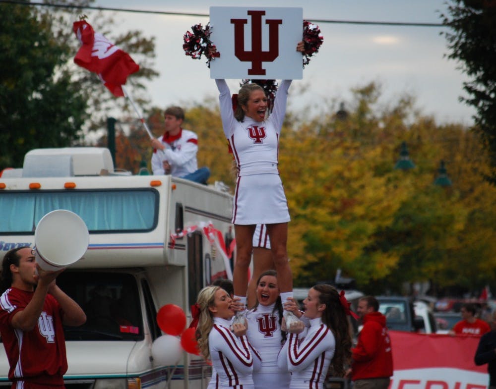 The IU Cheerleaders stop on Kirkwood to get the crowd spirit up. The parade concluded at Sample Gates with a pep rally.