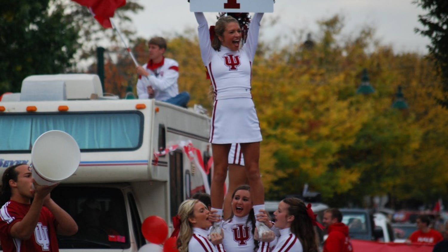 The IU Cheerleaders stop on Kirkwood to get the crowd spirit up. The parade concluded at Sample Gates with a pep rally.