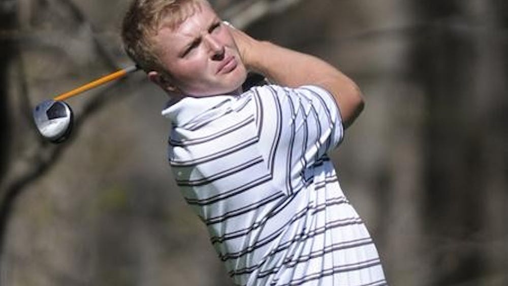Then-junior David Erdy watches his shot from the ninth tee during the adidas Hoosier Invitational on April 11 at the IU Golf Course.