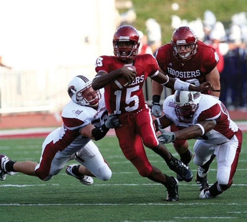 
IU quarterback Kellen Lewis tries to escape the grasp of two saluki defenders during a Sept. 16, 2006 game at Memorial Stadium.