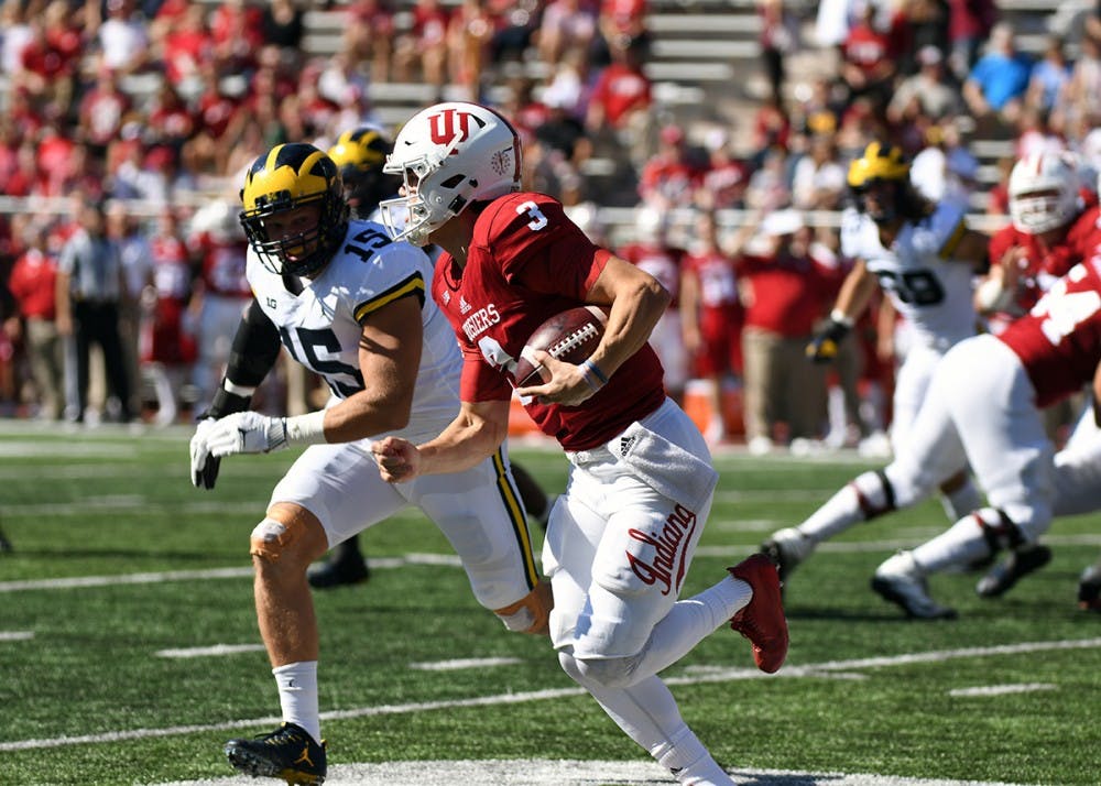 Sophomore quarterback Peyton Ramsey runs the ball against Michigan on Saturday afternoon at Memorial Stadium. Michigan defeated IU 27-20.