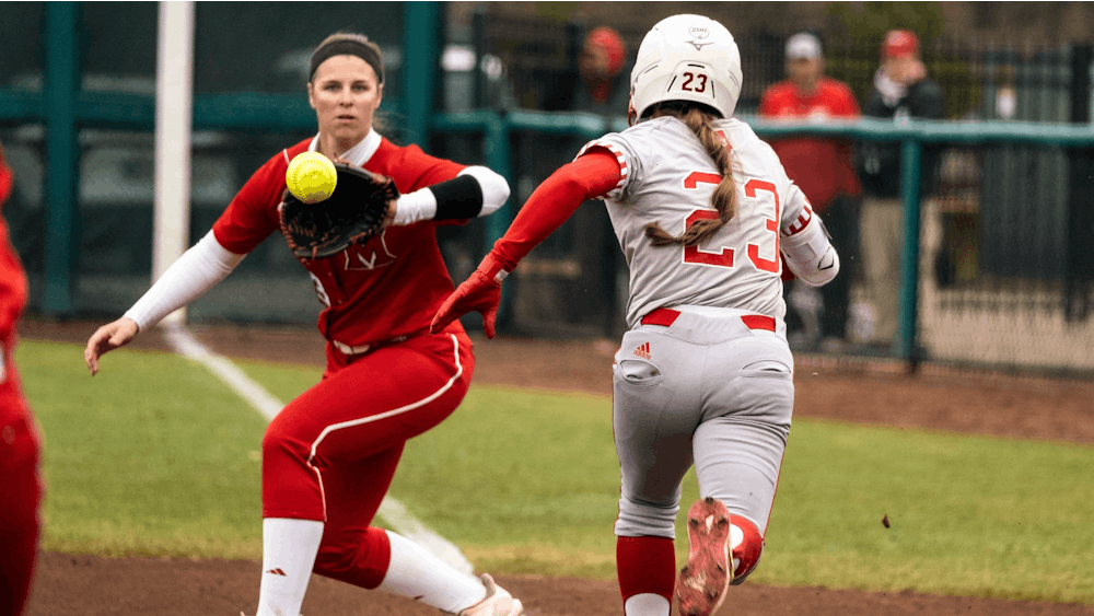 Senior Gabbi Jenkins runs to first base and was called safe by the umpire March 10 at Andy Mohr Field. IU will compete in The Spring Games Thursday through Saturday in Madeira Beach, Florida. 