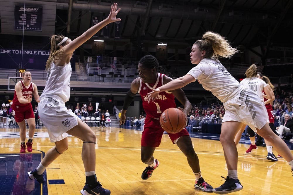 <p>Junior Bendu Yeaney drives to the basket through Butler University defenders Dec. 11 at Hinkle Fieldhouse in Indianapolis. IU announced that Yeaney will leave and enter the transfer portal. </p>