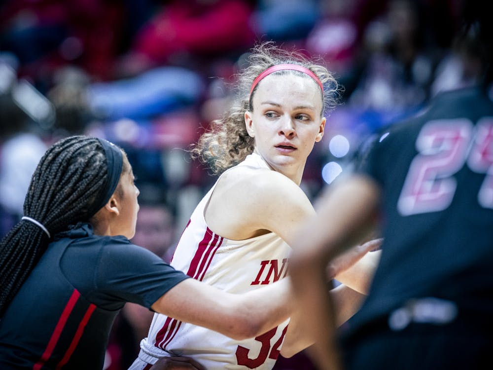 Senior guard Grace Berger looks to pass the ball Jan. 29, 2023 at Simon Skjodt Assembly Hall in Bloomington, Indiana. The Hoosiers beat Rutgers 91-68.
