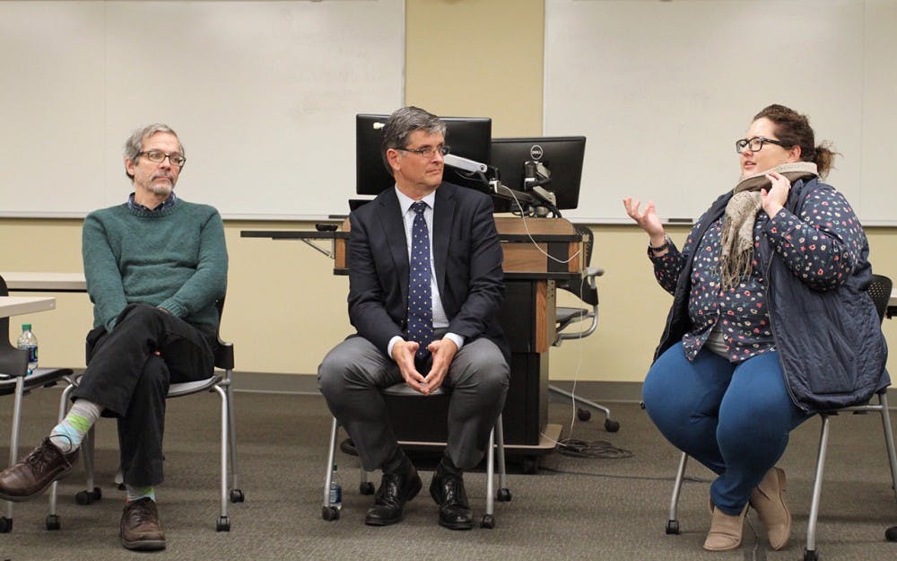 (From left to right) Prof. Michael Wilkerson, Michael Rushton and Ursula Kuhar talk about the U.S. visa and foreign artists' immigration services Tuesday.