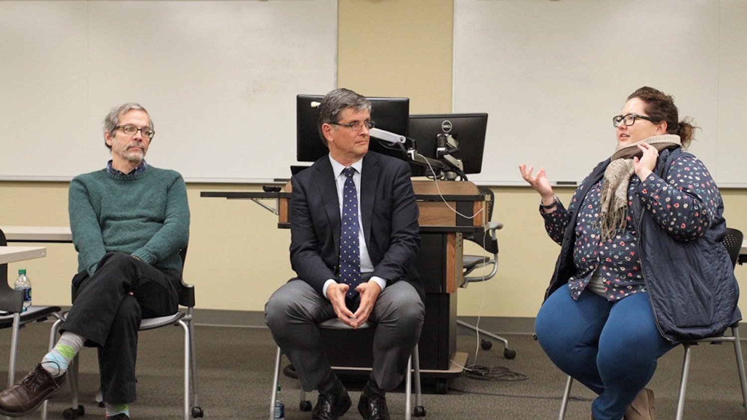 (From left to right) Prof. Michael Wilkerson, Michael Rushton and Ursula Kuhar talk about the U.S. visa and foreign artists' immigration services Tuesday.