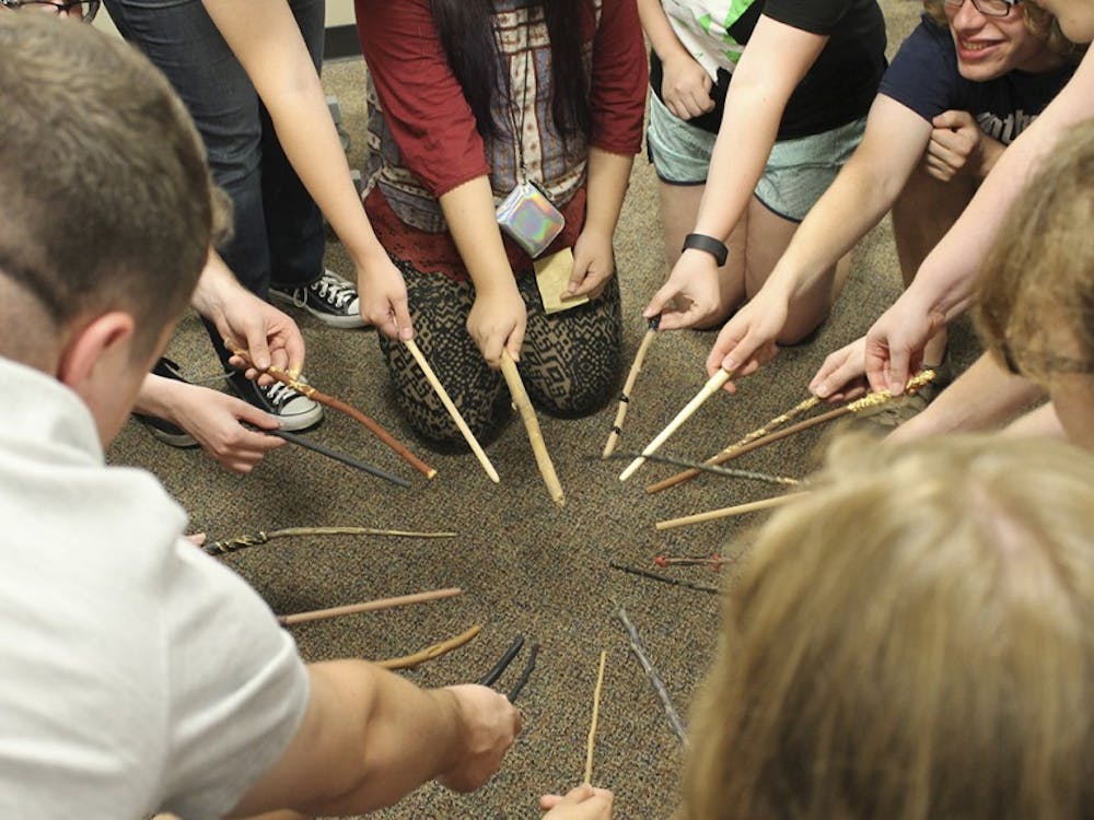 The Harry Potter Society of Indiana University show off their handcrafted wands Sunday at Woodburn Hall.