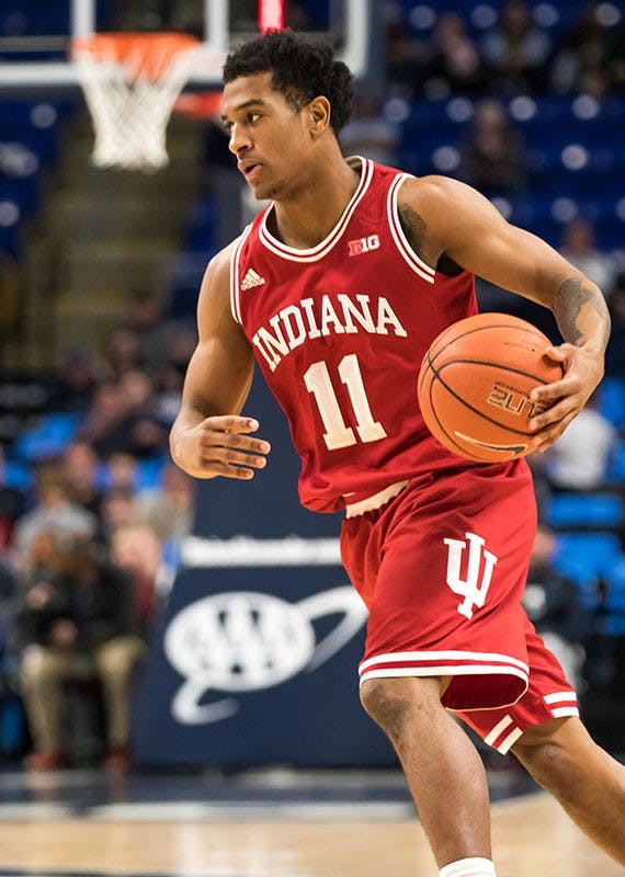 Devonte Green (freshman) Indiana player, breaks through Penn State's defense while in control of the ball at the Bryce Jordan Center on Wednesday, Jan. 18, 2017.