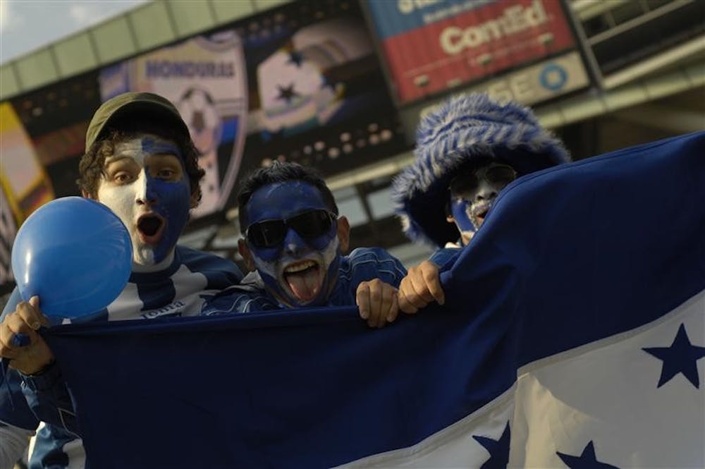 Honduras fans cheer as they wait for the USA versus Honduras match to begin. The game is slated to start at 8 p.m.