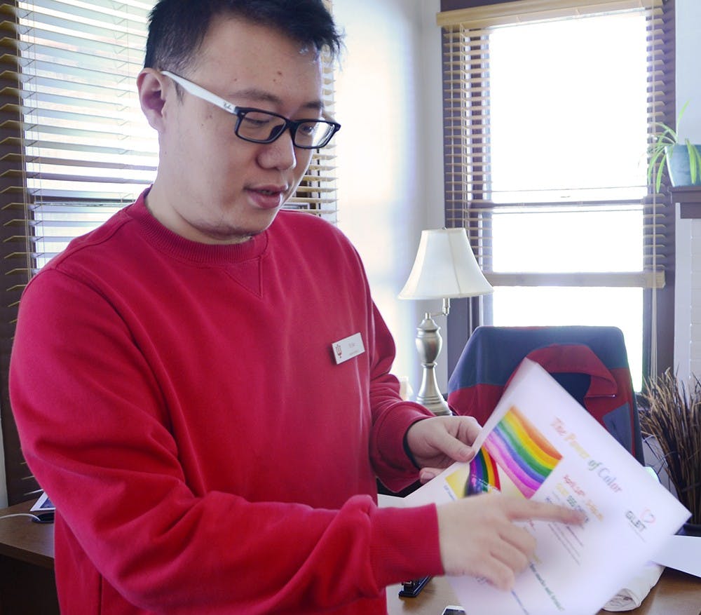 Yi Jin, student intern at IU GLBT Student Support Center, introduces the color therapy event Tuesday at his office. 