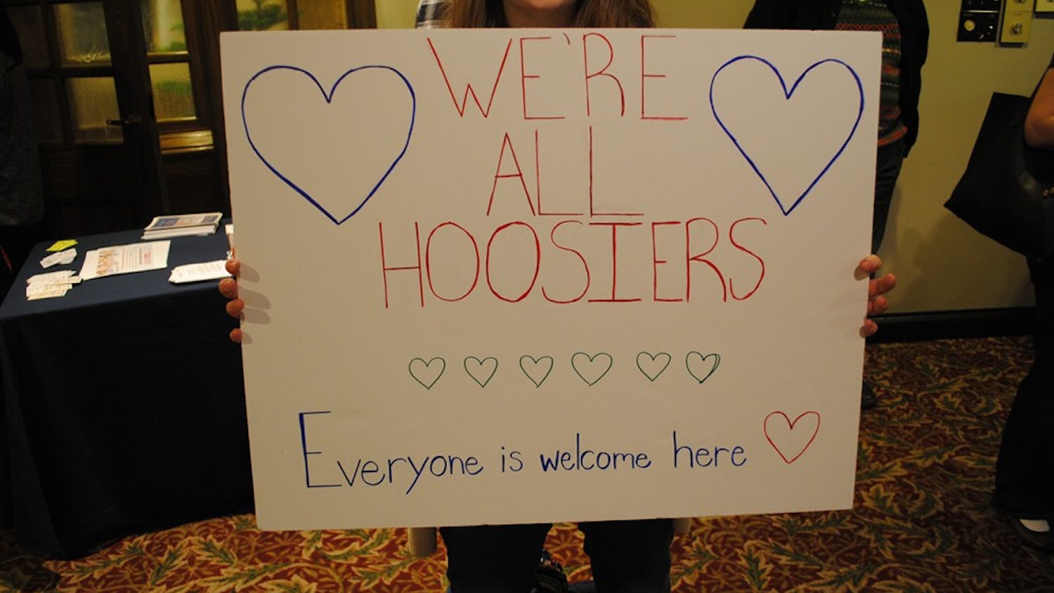 IU students and faculty filled the hallways of the Indiana Memorial Union around the Frangipani room and brought signs and food for those passing by them. They came in support for international students affected by Trump's recent executive order banning travelers from seven Muslim-majority countries.