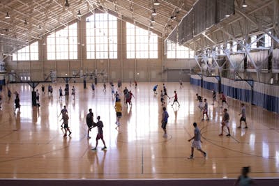 Students play basketball in the then Ora L. Wildermuth Intramural Center in 2018. IU Health physician Kevin Miller said that people should try to exercise outside if possible and that he would consider most gym activities high risk because they&#x27;re inside.