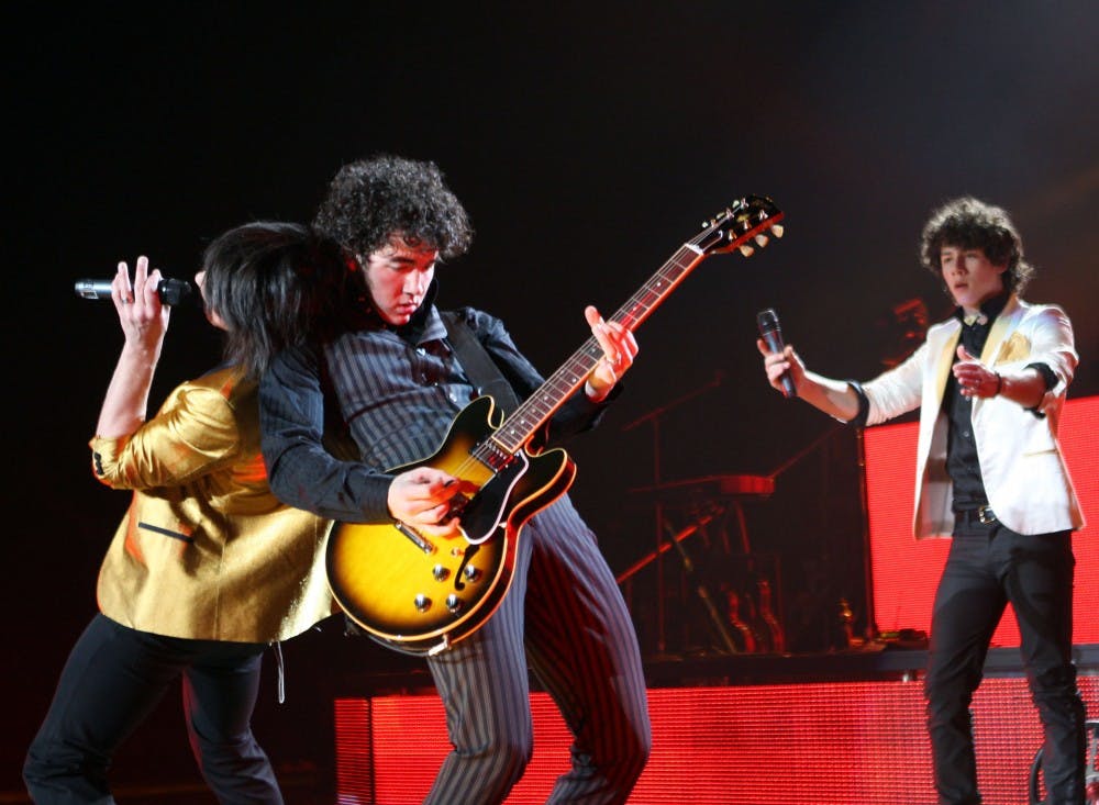 Then-tween sensations the Jonas Brothers, from left, Joe, 18, Kevin, 20, and Nick, 15, perform Feb. 20, 2008, at the Target Center in Minneapolis.