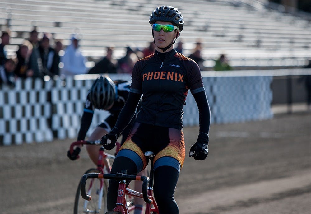Senior Tabitha Sherwood of Phoenix Cycling sits up in the saddle after winning Miss N Out on Saturday at Bill Armstrong Stadium.